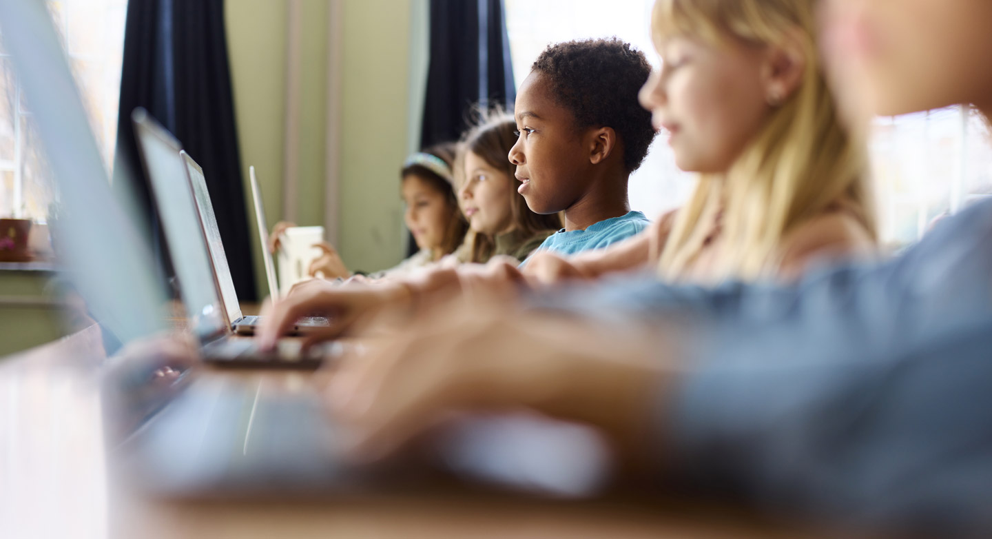School Kids on Computers | Legacy Hoops School